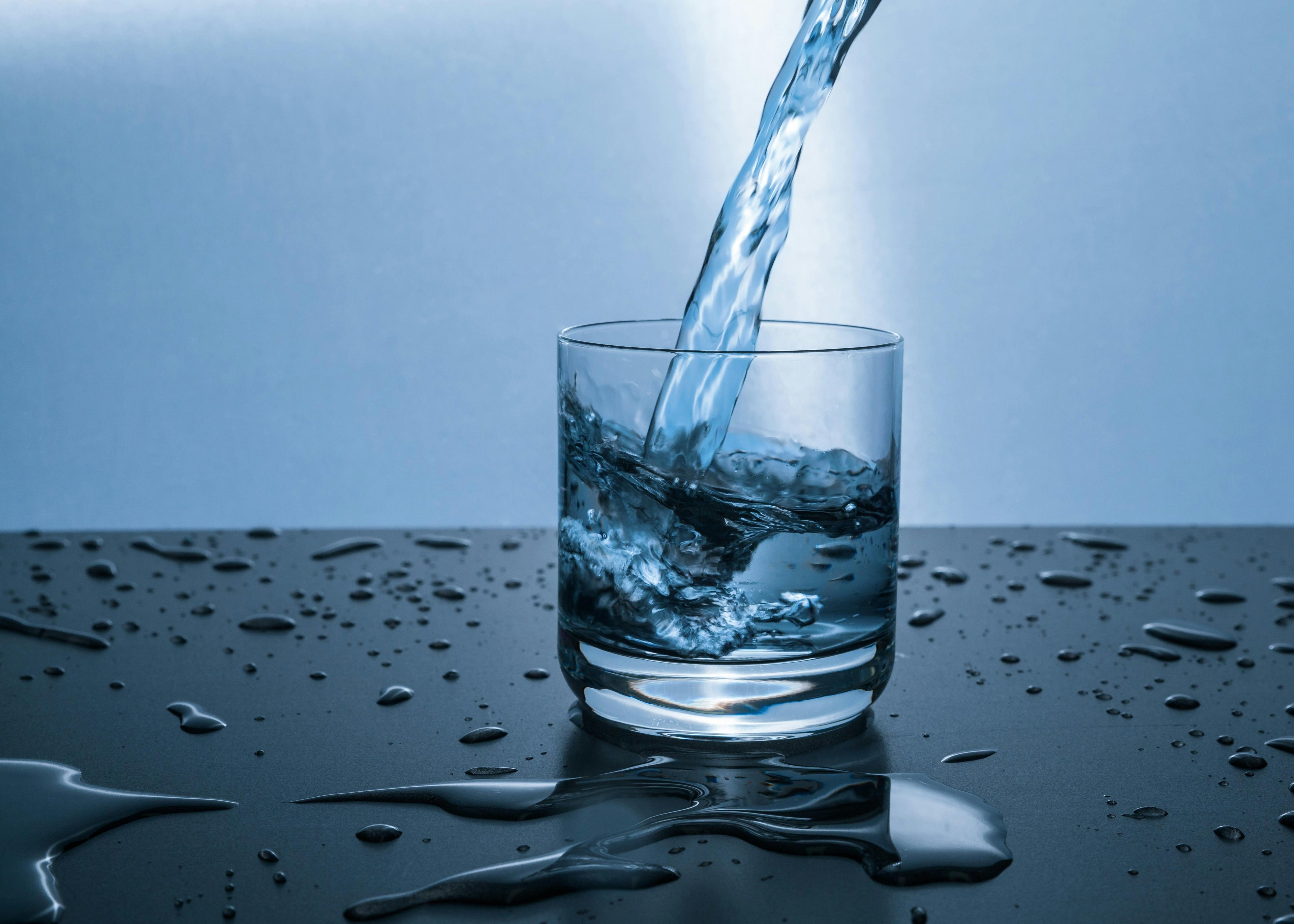 Water Pouring in Cup